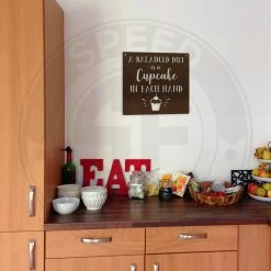 Speed Fabrication Home Decor & Gifts A Balanced Diet Is A Cupcake In Each Hand Metal Sign