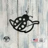 Speed Fabrication Decor Ladybug On Leaf Metal Sign