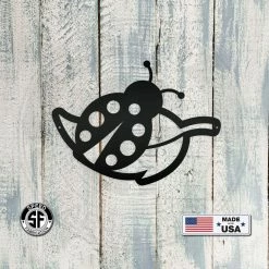Speed Fabrication Decor Ladybug On Leaf Metal Sign